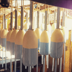 lobster buoys painted in workroom